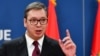 FILE - Serbian President Aleksandar Vucic gestures as he speaks during a press conference in Belgrade, Oct. 19, 2019.