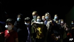 Evacuated citizens from Afghanistan arrive at Tirana International Airport in Tirana, Albania, Aug. 27, 2021. 