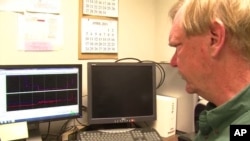 Plant physiologist Lewis Ziska has been comparing cultivated rice and a weedy red rice relative for several years for the USDA