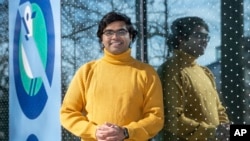 Pranay Karkale, a first-year graduate student at Johns Hopkins University from Nashik, India, stands at the university's campus in Baltimore on Sunday, Feb. 18, 2024. (AP Photo/Steve Ruark)
