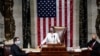 U.S. Speaker of the House Nancy Pelosi (D-CA) wields her gavel ahead of the final passage in the House of Representatives of U.S. President Joe Biden's $1.9 trillion coronavirus relief bill inside the House Chamber of the Capitol.