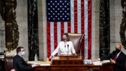 FILE - US Speaker of the House Nancy Pelosi (D-CA) wields her gavel ahead of the final passage in the House of Representatives of U.S. President Joe Biden's $1.9 trillion coronavirus relief bill inside the House Chamber of the Capitol.