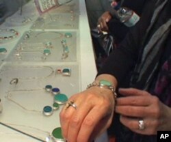 Amy Faust creates jewelry made from beach glass, recycled bottles, chipped dinner plates and pottery shards.