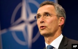 FILE - NATO Secretary General Jens Stoltenberg addresses the media at NATO headquarters in Brussels, Nov. 24, 2015.