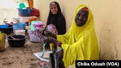 Mary Isu (black hijab) has had 5 fistula repair surgeries. Mary Amani (yellow hijab) has had 4. But they are still leaking.