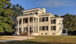 Lavish mansions, like the one built at Oatlands in 1804 in Leesburg, Virginia, were common at the large southern plantations where the white families lived. (Courtesy Caleb Schutz, Oatlands)