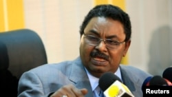 FILE - Salah Gosh, special security adviser to President Omar al-Bashir, speaks during a news conference in Khartoum, March 13, 2011. 