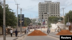 A general view shows metal spikes and dirt on a road set as barricades by Somali military troops supporting opposition leaders in Hodan district of Mogadishu, Somalia, April 26, 2021 