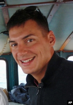 FILE - This undated file photo obtained from the family of Austin Tice, shows American freelance journalist Austin Tice, who was taken hostage in Syria in 2012.