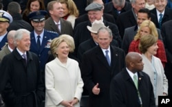 Former President George W. Bush, right, his wife Laura, Former Secretary of State Hillary Clinton and Former President Bill Clinton wait for the 58th Presidential Inauguration for President-elect Donald Trump at the U.S. Capitol in Washington, Jan. 20, 20