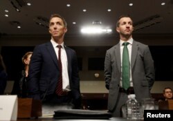 FILE - Keith Enright, chief privacy officer at Google, and Damien Kieran, global data protection officer and associate legal director at Twitter, stand before testifying before a Senate panel on Capitol Hill, in Washington, Sept. 26, 2018.