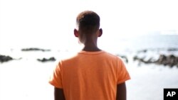 FILE - Alhaji, who is gay and whose last name has been withheld for his safety, poses for a picture at La Pointe des Almadies, in Dakar, Senegal.