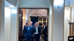 International Atomic Energy Agency (IAEA) director general, Rafael Mariano Grossi is welcomed by deputy chief of Atomic Energy Organization of Iran, upon his arrival at Mehrabad airport in Tehran, Nov. 13, 2024. (Atomic Energy Organisation of Iran via AP)