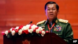 Myanmar's Army Commander Senior Gen. Min Aung Hlaing speaks at the Myanmar International Convention Center in Naypyitaw, Feb. 13, 2018. 