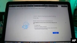 FILE - A computer screen showing a blocked Facebook window is seen in Colombo, Sri Lanka, March 7, 2018.