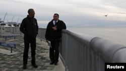 U.S. President Barack Obama (L) tours the Kotzebue Shore Avenue Project, an effort to protect against rising sea levels in Kotzebue, Alaska Sept. 2, 2015. 