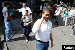Nicmer Evans (foreground), opposition candidate for mayor of Caracas' Libertador district, attends a campaign rally in the Venezuelan capital, Nov. 24, 2017.
