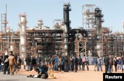 A general view of damage is seen following an attack and ensuing siege by Islamist militants at a gas plant in Ain Amenas, Algeria, Jan. 31, 2013. Mokhtar Belmokhtar was seen as the mastermind of the operation.