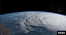 The International Space Station orbited over Hurricane Harvey and photographed the storm bearing down on the Texas coast.
