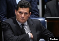 Brazilian federal judge Sergio Moro reacts during a session at the Federal Senate in Brasilia, Brazil, Dec. 1, 2016.