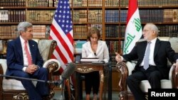 U.S. Secretary of State John Kerry meets with Iraq's Foreign Minister Ibrahim al-Jaafari (R) in Baghdad September 10, 2014. Kerry identified Iraq as a key partner in the fight against IS. REUTERS/Thaier Al-Sudani 