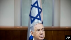 FILE - Israeli Prime Minister Benjamin Netanyahu attends a weekly cabinet meeting in Jerusalem, Jan. 4, 2015.