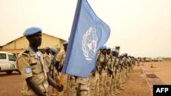 FILE - Senegalese peacekeepers belonging to MINUSMA (the U.N. Multidimensional Integrated Stabilization Mission in Mali) line up ahead of the arrival of the U.N. secretary-general, May 30, 2018, in Sevare.