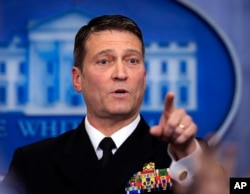 FILE - White House physician Dr. Ronny Jackson calls on a reporter during the daily press briefing at the White House, in Washington, Jan. 16, 2018.