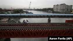 The Philippines is seek development aid hoping improved infrastructure, like bridges, roads and rail, will attract foreign investment.