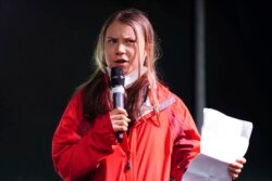 FILE - Climate activist Greta Thunberg speaks on the stage after a protest during the Cop26 summit in Glasgow, Scotland, Nov. 5, 2021. (Jane Barlow/PA via AP)