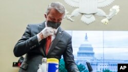 Dr. Richard Bright, former director of the Biomedical Advanced Research and Development Authority, arrives for a House Energy and Commerce health subcommittee hearing, May 14, 2020. 