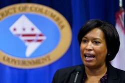 FILE - District of Columbia Mayor Muriel Bowser speaks during a news conference in Washington, Nov. 4, 2020.