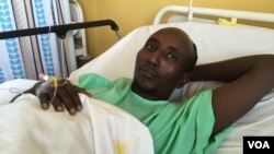 Salah Sabdow Farah was shot when the bus he was traveling in was attacked by al-Shabab militants in December 2015. He is recovering at Nairobi's Kenyatta National Hospital in January 2016.(J. Craig/VOA)