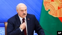 FILE - Belarusian President Alexander Lukashenko speaks during a press conference in Minsk, Belarus, Aug. 9, 2021. 