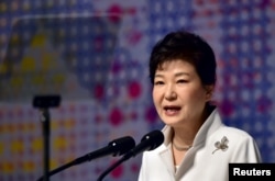 FILE - South Korean President Park Geun-hye delivers a speech in Seoul, March 1, 2016.