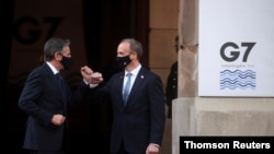Britain's Foreign Secretary Dominic Raab welcomes his U.S. counterpart, Antony Blinken, as G-7 foreign ministers meet at Lancaster House, in London, Britain, May 5, 2021.