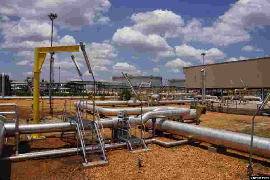 Pipelines criss-cross at the Paloch oil field in South Sudan on Sunday, May 5, 2013, when production resumed at the facility after a 16-month break.