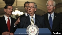 FILE - U.S. Senate Majority Leader Mitch McConnell (R-KY) (C) speaks after their party's caucus luncheons on Capitol Hill in Washington, June 23, 2015. 