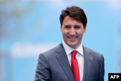 In this file photo Canadian Prime Minister Justin Trudeau arrives to attend the North Atlantic Treaty Organization (NATO) summit in Brussels on July 12, 2018.