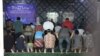Penganut Ahmadiyah melaksanakan salat dzuhur berjamaah usai peringatan Isra Mi'raj di Bandung, Jawa Barat, Rabu, 3 April 2019 siang. (VOA/Rio Tuasikal)