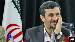 Iranian President Mahmoud Ahmadinejad, President of the Islamic Republic of Iran, listens during a press conference in New York, September 23, 2011.