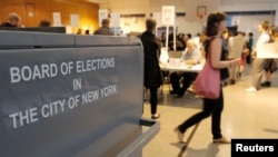People vote in the New York primary elections at a polling station in the Brooklyn borough of New York City, April 19, 2016. 