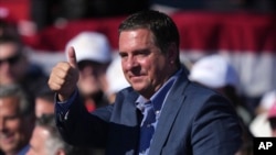 FILE - Devin Nunes gestures during a campaign rally in Lititz, Pennsylvania, Nov. 3, 2024. On Saturday, U.S. President-elect Donald Trump named the former U.S. lawmaker — who runs Trump's Truth Social platform — to serve as chairman of the President's Intelligence Advisory Board.