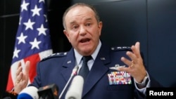 FILE - U.S. Air Force General Philip Breedlove, pictured at a Kyiv news conference in November 2014, says Russia is seeking to tighten its grip on separatist fighters "because there was disunity" inn some earlier attacks.