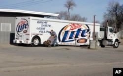 FILE - This photo from March 6, 2006 shows a shipment of beer being delivered to a store in Whiteclay, Neb.