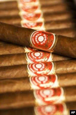 Expensive Cuban cigars are a status symbol for South Africa's elites