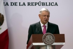 Mexican President Andres Manuel Lopez Obrador speaks during a ceremony marking the third anniversary of his presidential election at the National Palace in Mexico City, July 1, 2021.