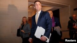 FILE - Michael Cohen, the former personal attorney of U.S. President Donald Trump, arrives to testify before a closed House Intelligence Committee hearing on Capitol Hill in Washington, Feb. 28, 2019.