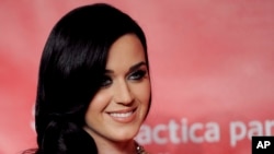 Katy Perry arrives at the MusiCares Person of the Year tribute honoring Bruce Springsteen at the Los Angeles Convention Center on Feb. 8, 2013, in Los Angeles.