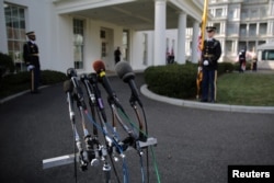 Microphones are seen outside of the Oval Office prior to the arrival of British Prime Minister Theresa May for a visit to U.S. President Donald Trump at the White House in Washington, Jan. 27, 2017.